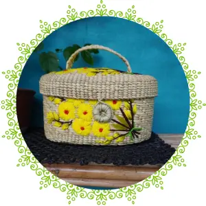 a hand woven basket with yellow flowers on it