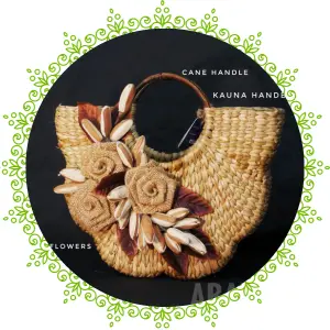 a handmade handbag with flowers and leaves