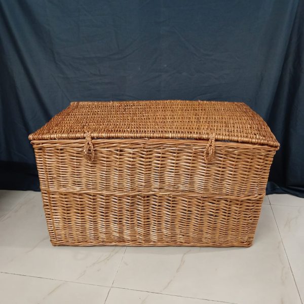 a hand woven wicker big basket with lid