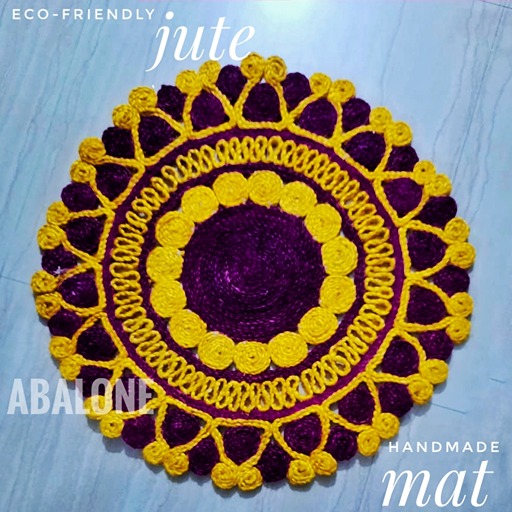 a handmade round jute mat