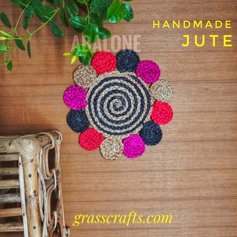 a hand woven round shaped jute mat
