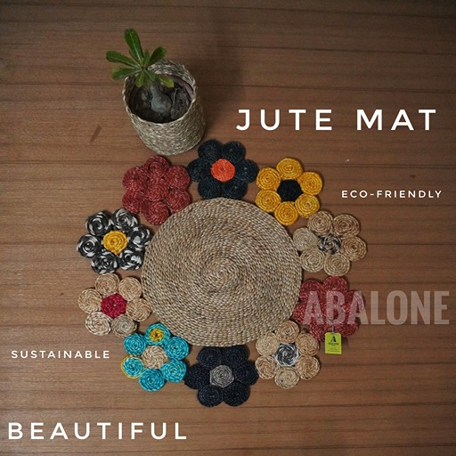 a hand woven round jute mat