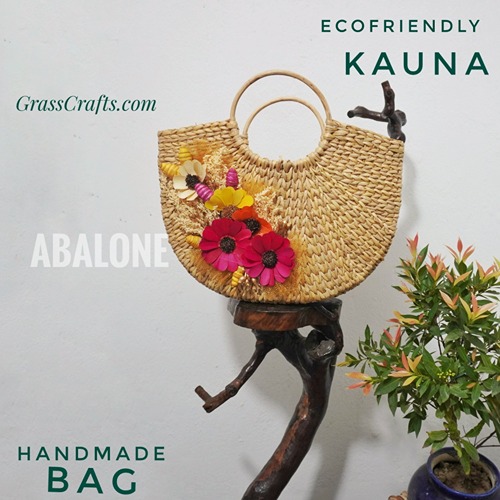 a handmade customized bag with cane handle