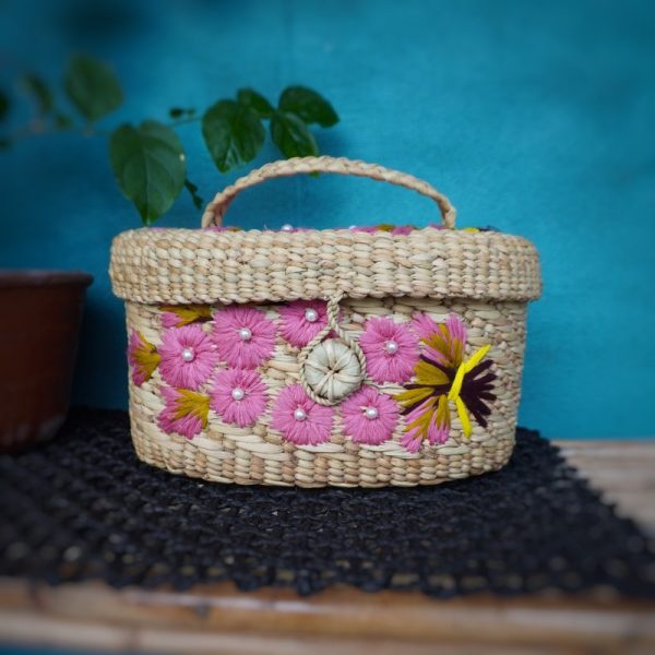 a diwali gift box with a pink floral design on it