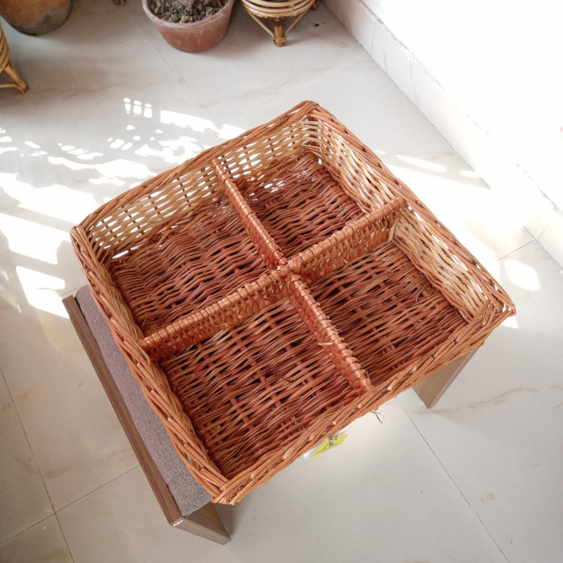 A square wicket basket with compartments